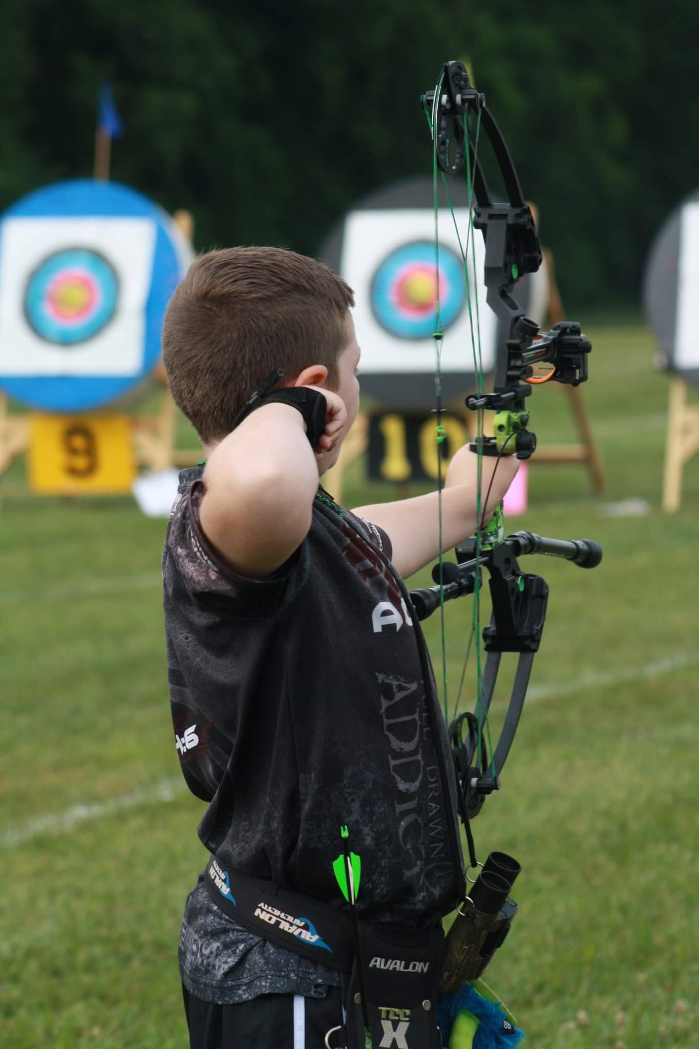 Child practicing archery